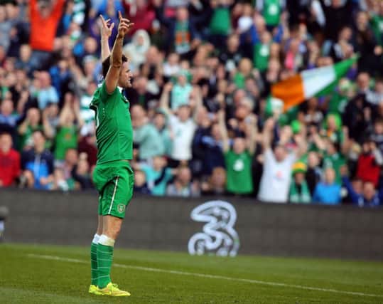 Robbie Keane celebrates scoring his team's second goal in Dublin. Picture: Getty