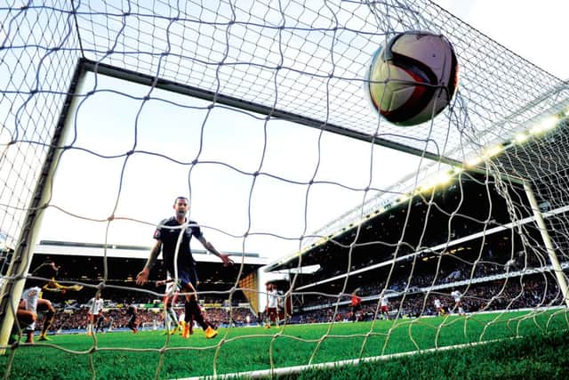 Steven Fletcher celebrates as he Shaun Maloneys shot is deflected into the net. Picture: Ian Rutherford