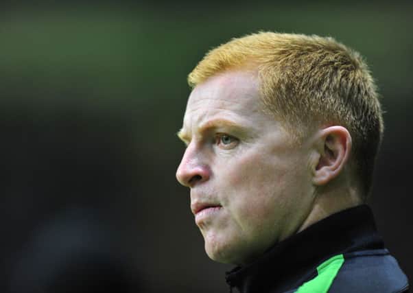 Neil Lennon watches Celtic as they play Barcelona at Parkhead in October 2013. Picture: Robert Perry