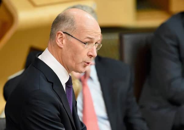 John Swinney has introduced a leap in the rates on properties being purchased for 350,000 pounds and over. Picture: Getty
