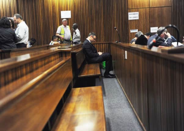 Oscar Pistorius sits in the Pretoria High Court for sentencing in his murder trial. Picture: Getty