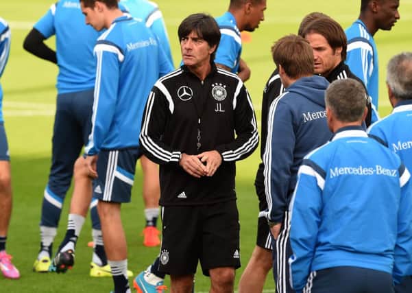 Head coach Joachim Loew talks to  the players during a training session in Essen, Germany. Picture: Getty