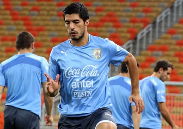 Luis Suarez training on eve of Uruguay's friendly match against Saudi Arabia. Picture: AFP