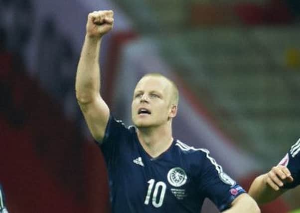 Steven Naismith celebrates after scoring to put Scotland 2-1 ahead. Picture: Getty