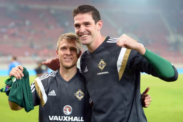 Northern Ireland's goalscorers Jamie Ward (left) and Kyle Lafferty celebrate. Picture: PA