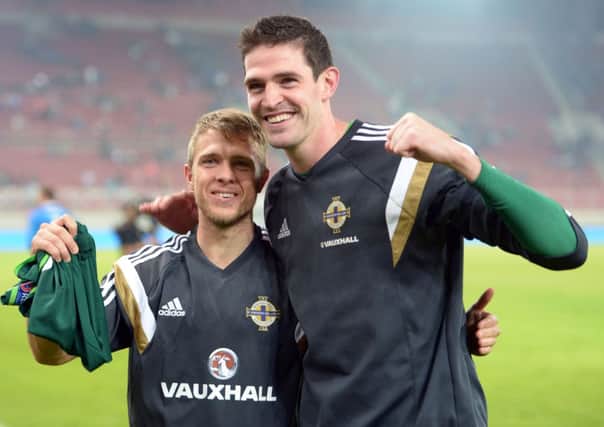 Northern Ireland's goalscorers Jamie Ward (left) and Kyle Lafferty celebrate. Picture: PA