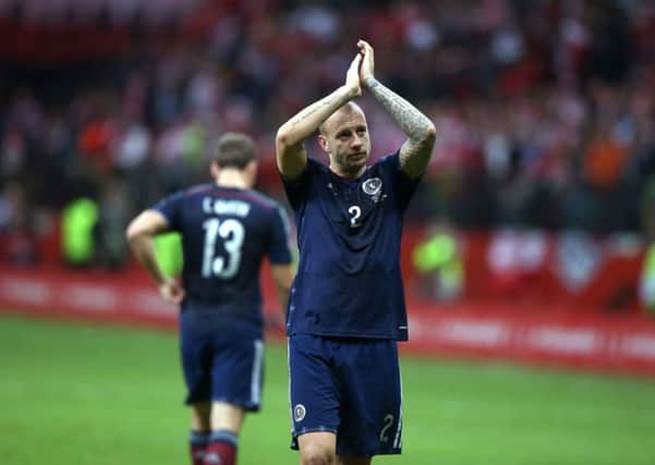 Scotland's Alan Hutton applauds the fans at the end of the match against Poland. Picture: PA