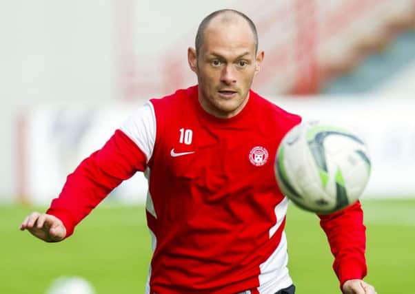 Hamilton player-manager Alex Neil in training. Picture: SNS