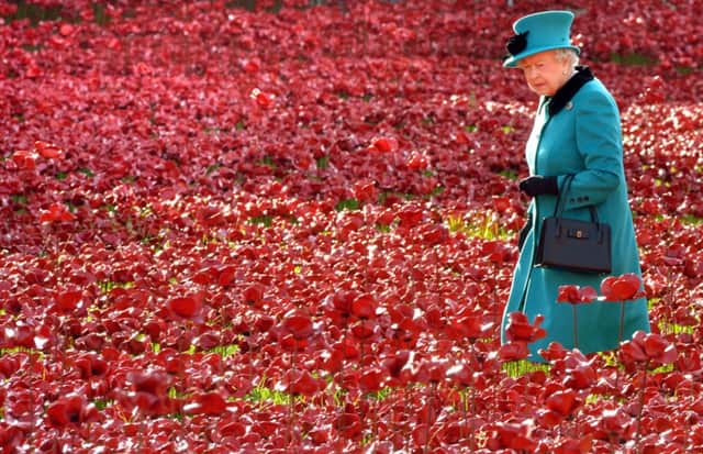 The Queen visits the unique memorial at the Tower of London. Picture: PA