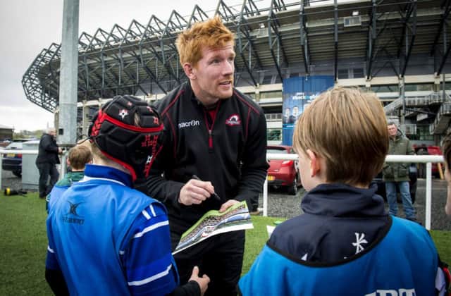 Roddy Grant signs autographs for fans after the Kids Camp training session at Murrayfield. Picture: SNS/SRU
