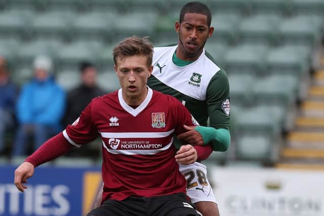 Jamie Reckord (back) playing for Plymouth in 2013. Picture: Getty