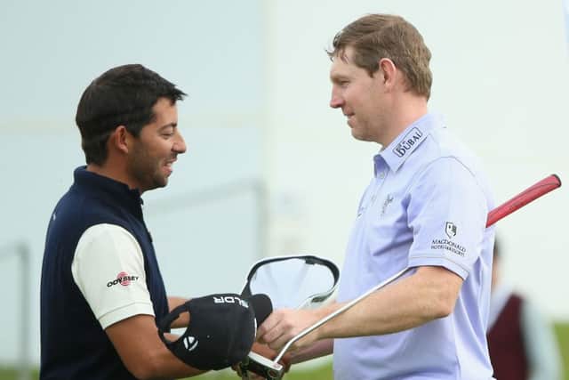 Stephen Gallacher shakes hands with Pablo Larrazabal after the Spaniard had grabbed victory at the last hole. Picture: Getty