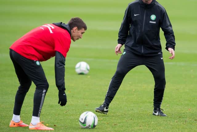 Celtic manager Ronny Deila (right) in high spirits at training. Picture: SNS
