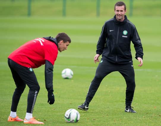 Celtic manager Ronny Deila (right) in high spirits at training. Picture: SNS