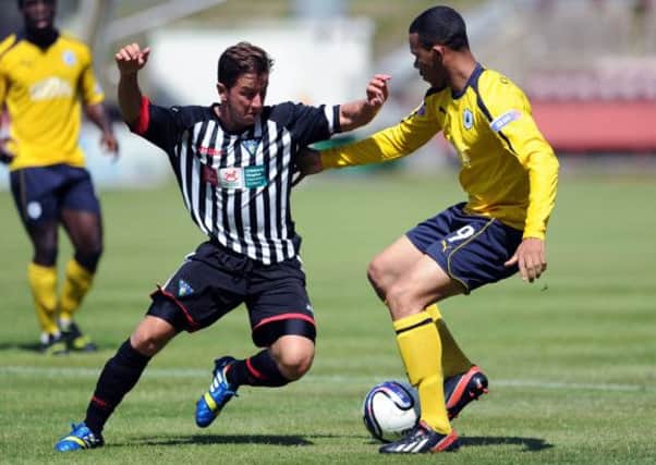 Rodgers also branded Dunfermlines Josh Falkingham, left, a cheat. Picture: John Devlin