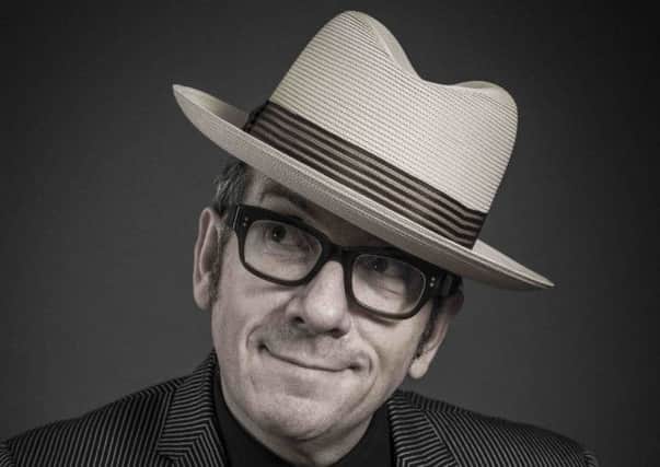 Elvis Costello told stories about his father and grandfather, providing links between their music and his own