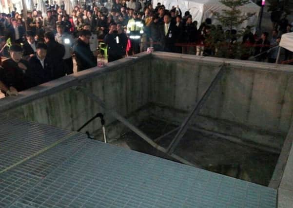 The collapsed ventilation grate at an outdoor theater in Seongnam, south of Seoul, South Korea. Picture: AP