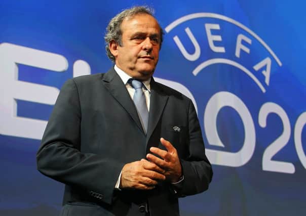 Michel Platini fears drones could be used to drop bombs on football pitches. Picture: PA