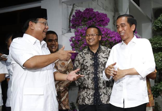 President-elect Joko Widodo (R)  meets with Prabowo Subianto. Picture: Reuters