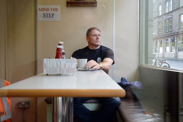 Taits cup of tea: the former Scotland centre is grateful to  be involved with rugby again. Picture: Neil Hanna