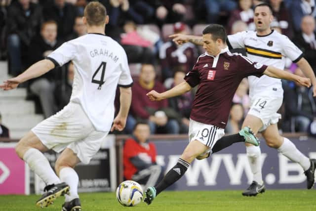 Jason Holt scores his goal against Dumbarton. Picture: Greg Macvean
