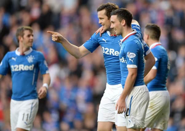 Rangers striker Jon Daly (left) celebrates his first goal of the game against Raith Rovers with Nicky Clark yesterday. Picture: SNS