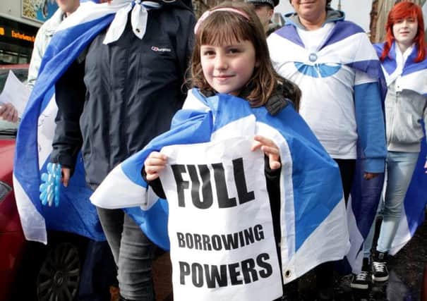 Marchers paraded in Glasgow on Saturday demanding more powers for Scotland. Picture: Hemedia