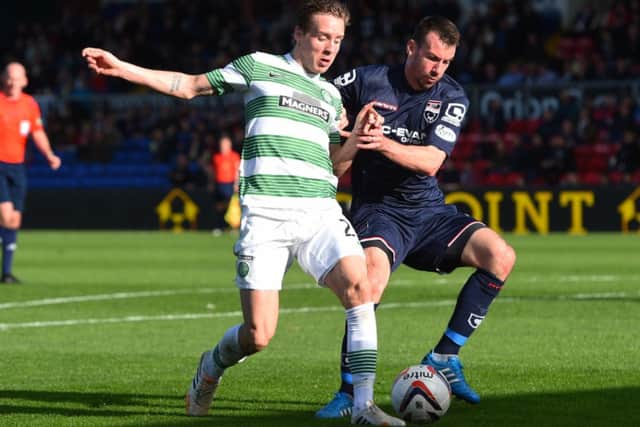Stefan Johansen, shadowed here by Paul Quinn, was in impressive form. Picture: SNS
