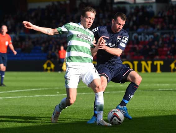 Stefan Johansen, shadowed here by Paul Quinn, was in impressive form. Picture: SNS