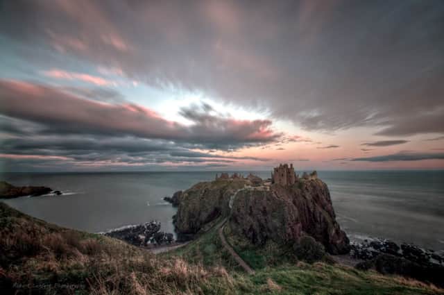 Calm before the storm over Dunnottar Castle in Aberdeenshire yesterday. Picture: HEMEDIA
