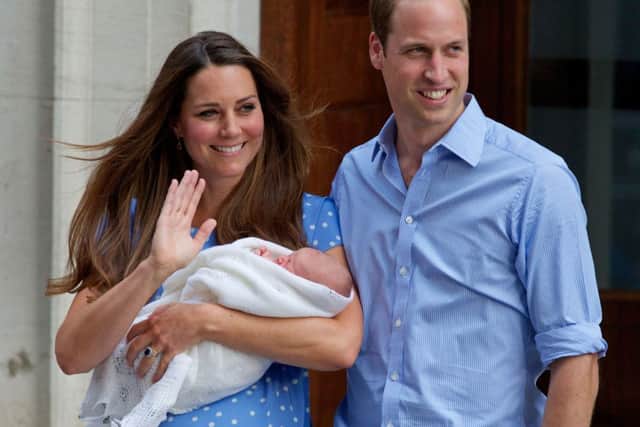 The Duke and Duchess of Cambridge with first child George in 2013. Picture: AFP