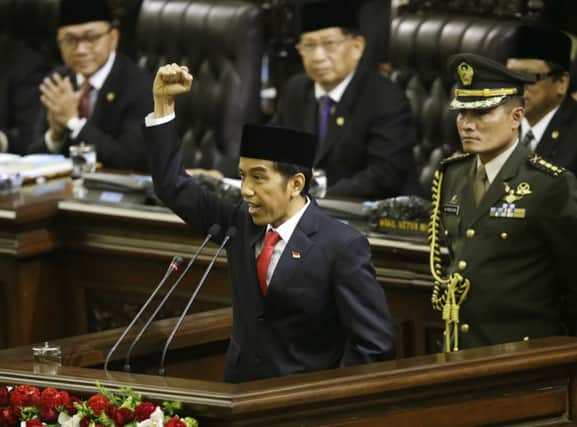 President Joko Widodo shouts freedom, as he delivers his inauguration speech. Picture: AP