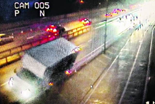 CCTV image of a van on the Forth Road Bridge threatening to topple over during the storm