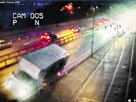 CCTV image of a van on the Forth Road Bridge threatening to topple over during the storm