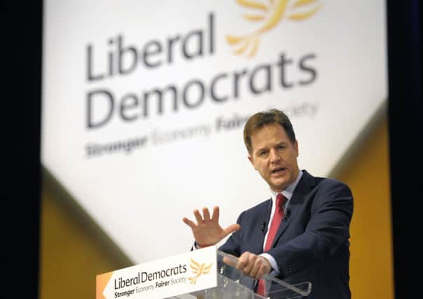 Details of the Liberal Democrats manifesto proposals were embarrassingly spotted by a photographer as a key aide left Nick Clegg's office. Picture: John Devlin