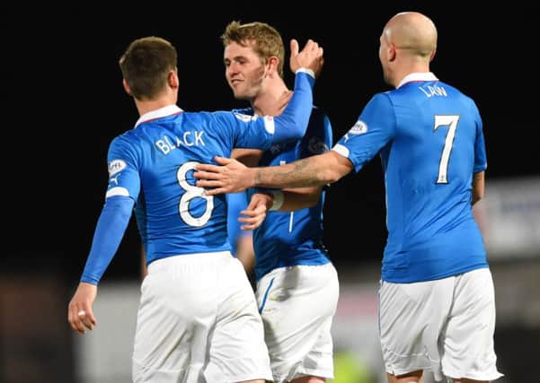 Rangers' Ian Black (left) is hailed by team-mates David Templeton (centre) and Nicky Law after his goal. Picture: SNS