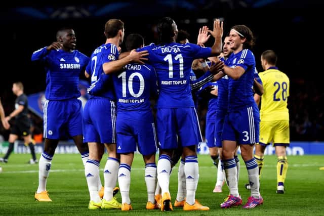 Eden Hazard is congratulated by teammates after his cross is deflected for an own goal by Mitja Viler of Maribor. Picture: Getty