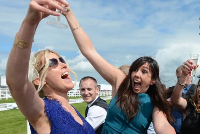 Racegoers enjoy Ladies Day at Musselburgh in June. Picture: Neil Hanna