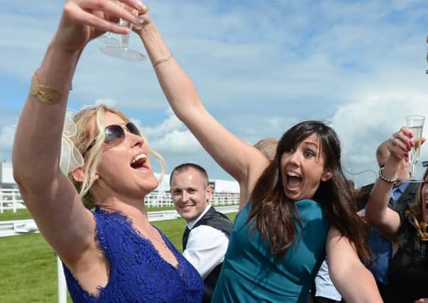 Racegoers enjoy Ladies Day at Musselburgh in June. Picture: Neil Hanna