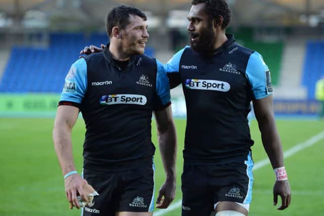 Leone Nakarawa, right, and Tim Swinson of Glasgow Warriors celebrate the 37-10 victory over Bath. Picture: Getty