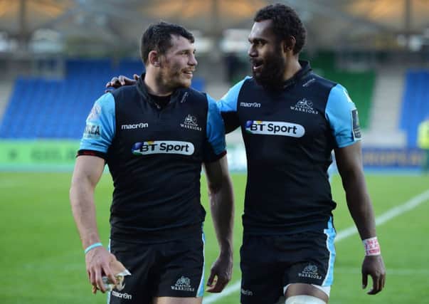 Leone Nakarawa, right, and Tim Swinson of Glasgow Warriors celebrate the 37-10 victory over Bath. Picture: Getty