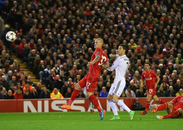 Cristiano Ronaldo scores Real Madrids opener with a sublime finish. Picture: Getty