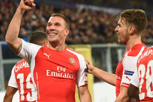 Lukas Podolski climbed off the bench to score dramatic winner. Picture: Getty
