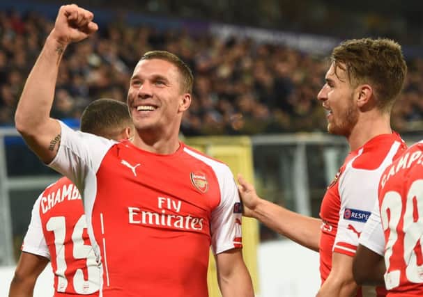 Lukas Podolski climbed off the bench to score dramatic winner. Picture: Getty