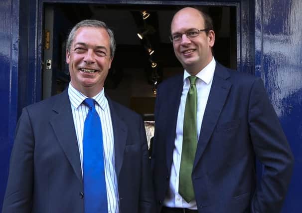 UKIP leader Nigel Farage pictured with Mark Reckless. Picture: PA