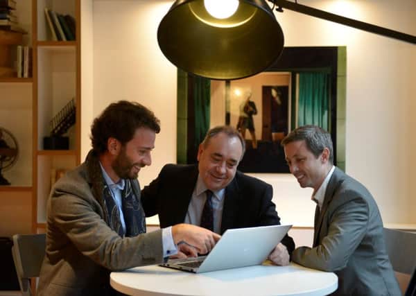 Alex Salmond, pictured with Geniac co-founders Michael Galvin, right, and Eduardo Martinez, left, at the Citizen M hotel in Glasgow. Picture: Hemedia