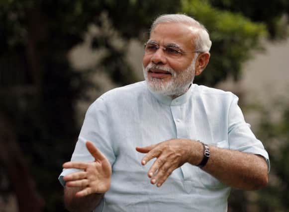 Narendra Modi is overhauling Indias archaic labour laws. Picture: Reuters