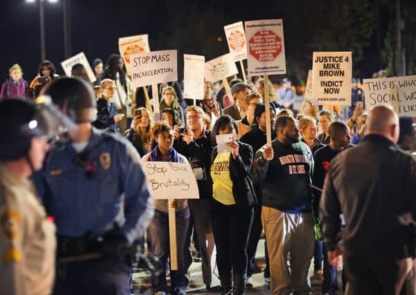 Demonstrators in Ferguson on Wednesday night. Picture: Getty