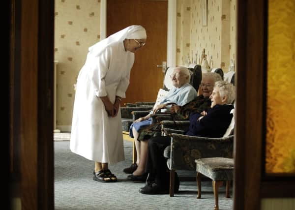 A nun from the order of the Little Sisters of the Poor checks on residents. Picture: Jane Emsley
