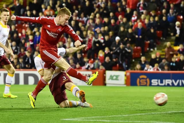 Aberdeen's Jonny Hayes gives his side the lead. Picture: SNS